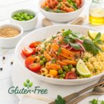 A vibrant plate of gluten-free pasta made from quinoa flour, topped with sautéed vegetables and herbs, perfect for gluten-free diets.